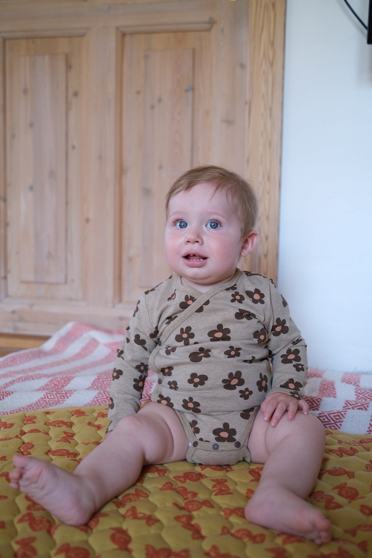 CHOCOLATE FLOWER WRAP BODYSUIT