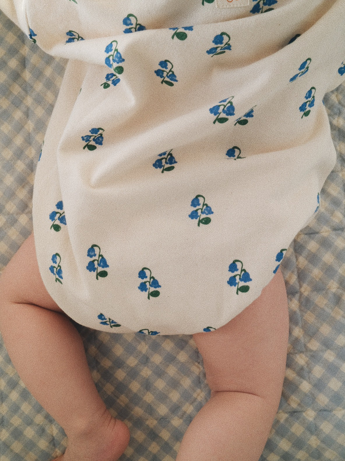 LILY OF THE VALLEY OVERSIZED BODYSUIT